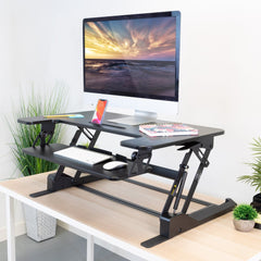 Desk that lets you sit or stand