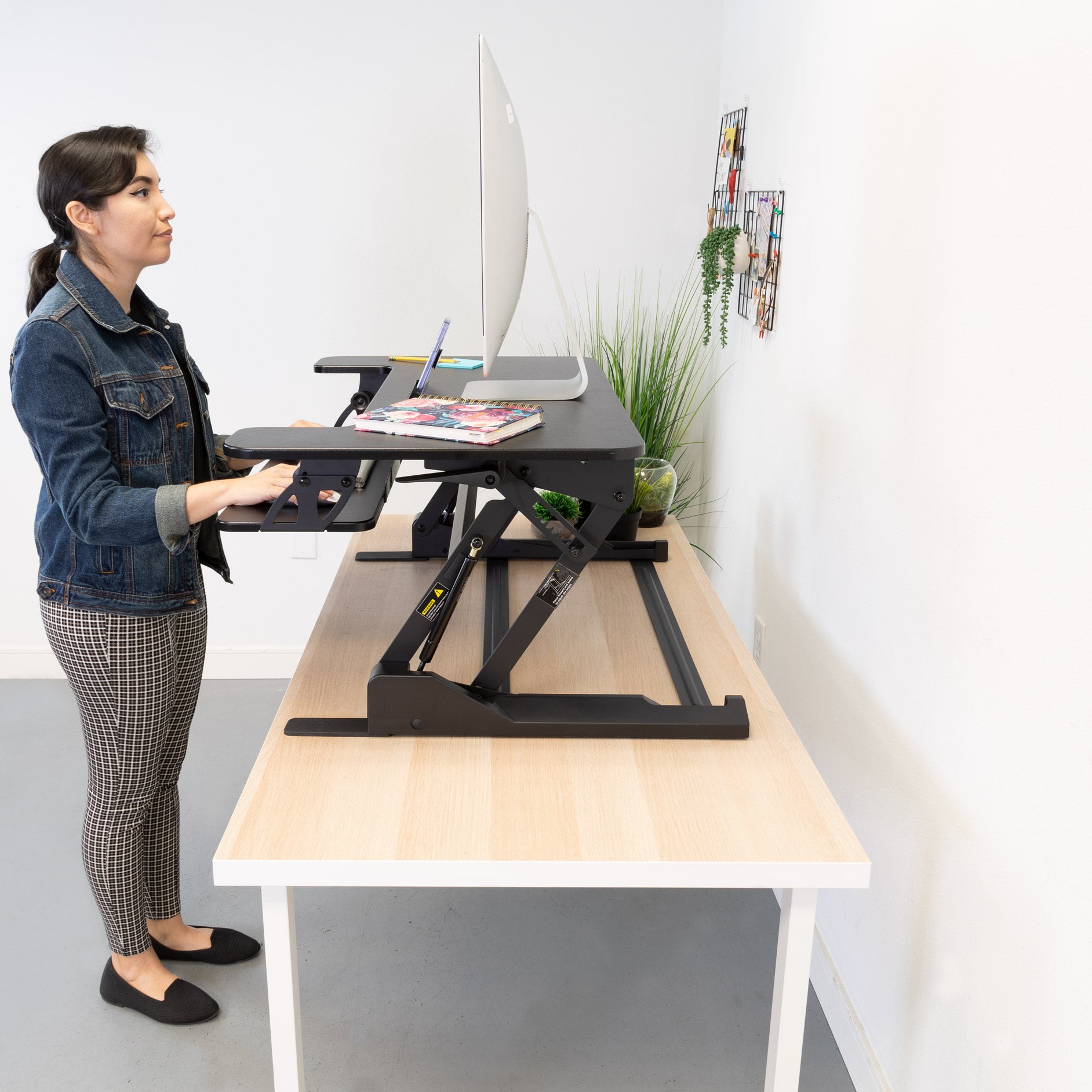 standing woman on computer