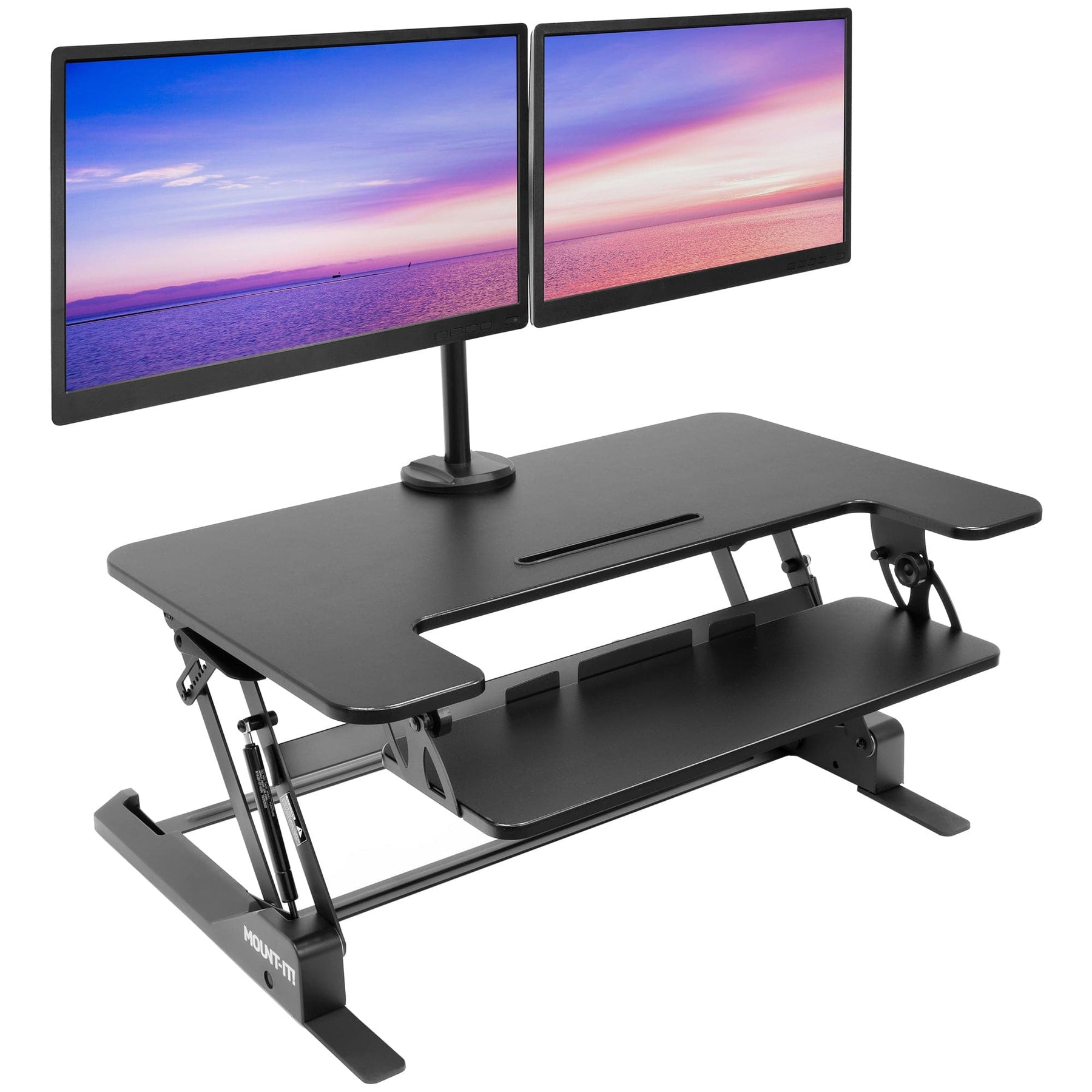 desk with two monitors 